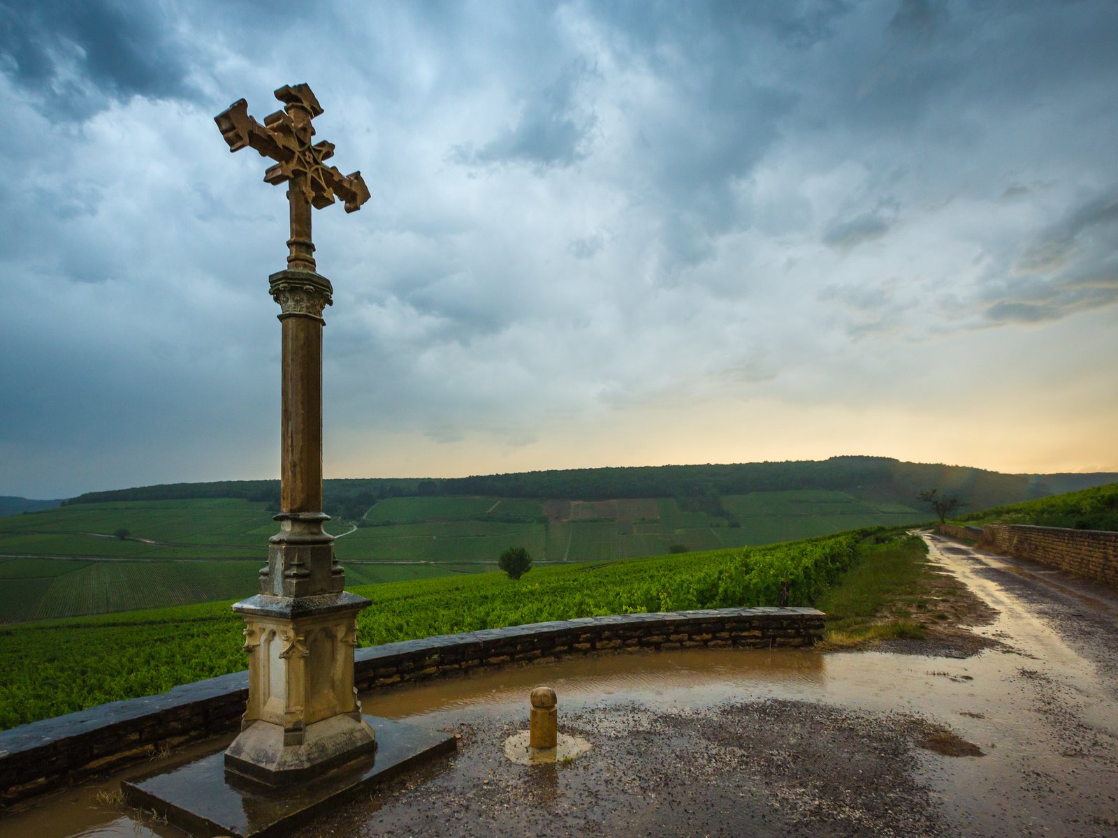 Storm sky over the Corton-Charlemagne cross, Aloxe-Corton, Burgundy